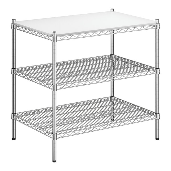 A Regency chrome metal shelving unit with white removable shelf inserts.
