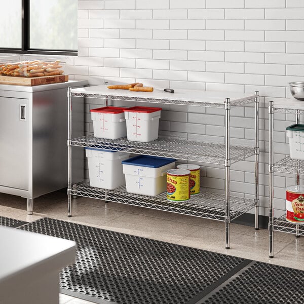 Regency chrome metal shelves with plastic shelf liners holding food items.