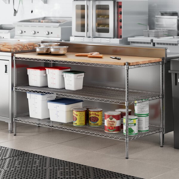 Regency chrome shelving on a counter with wooden shelves.