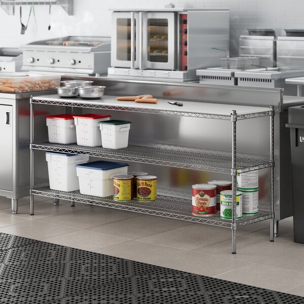 A kitchen with a large metal Regency shelf.