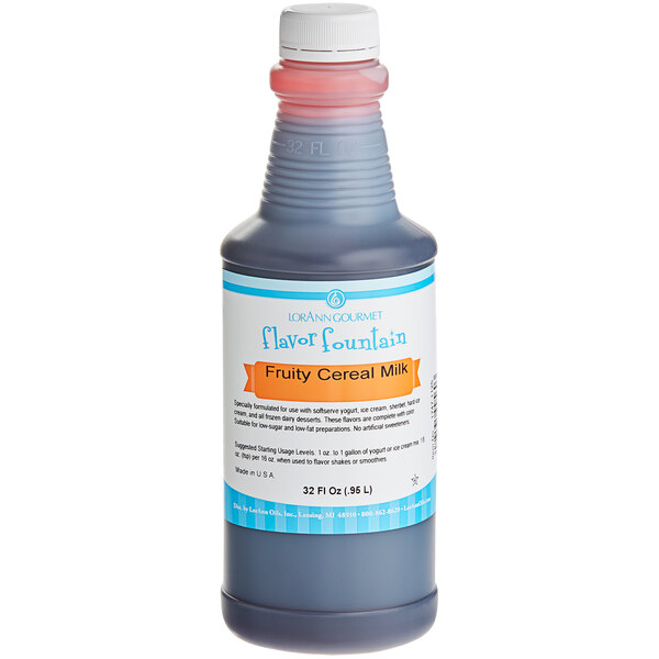 A close-up of a blue and white bottle of LorAnn Fruity Cereal Milk Flavor Fountain Syrup.