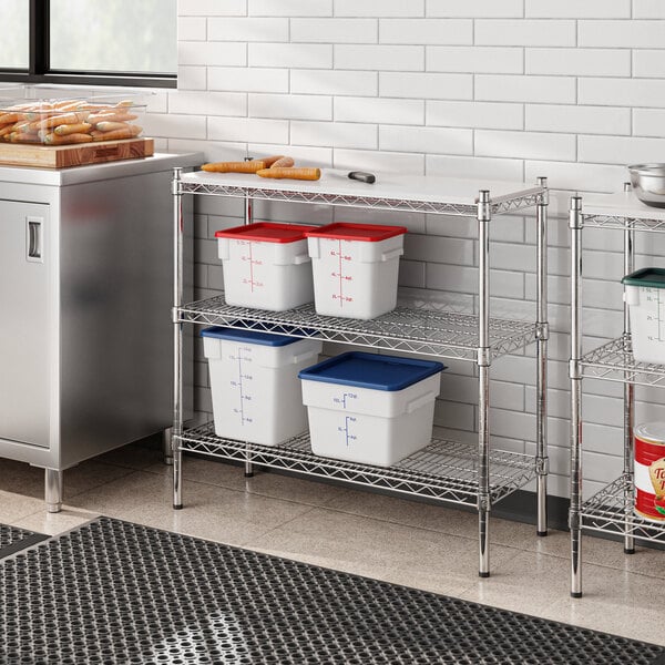 A Regency chrome metal shelving unit with plastic containers on the shelves.