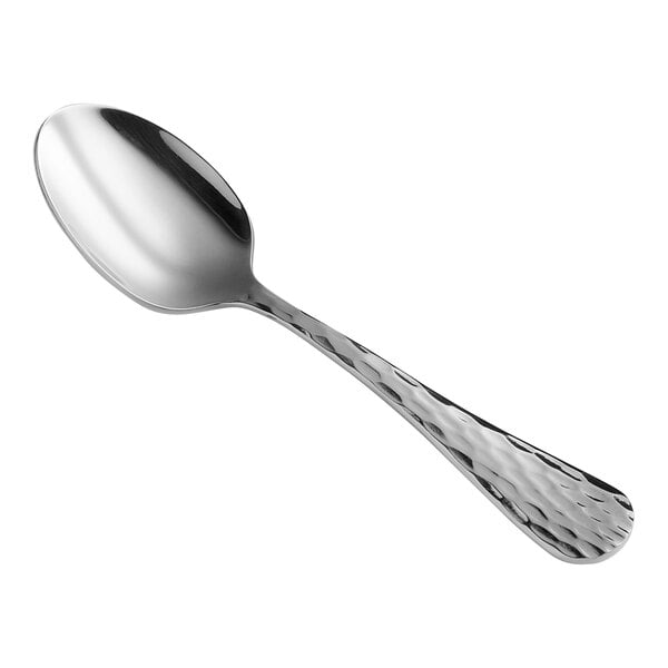 A shiny metal spoon with a textured handle and a smooth, rounded bowl.