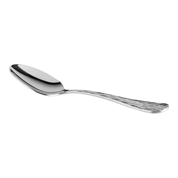 A shiny metal spoon with a textured handle is shown against a white background.