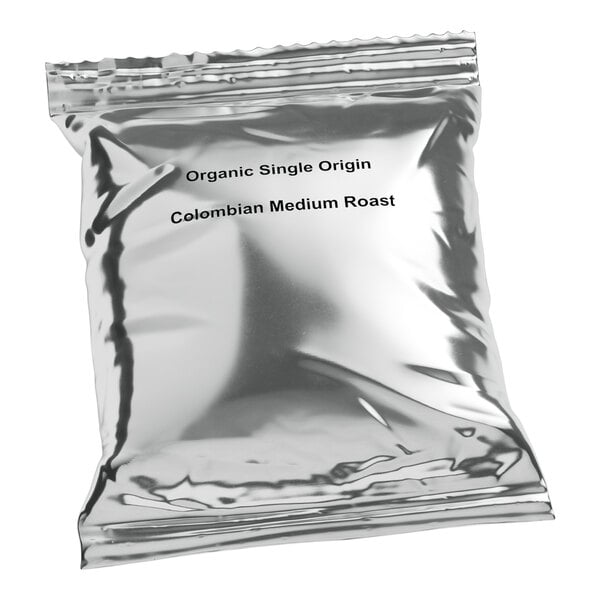 A silver Crown Beverages bag of organic single origin Colombian coffee.