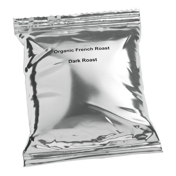 A silver Crown Beverages bag of organic French roast coffee.