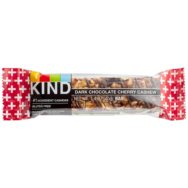 A close up of a KIND Dark Chocolate Cherry Cashew bar.