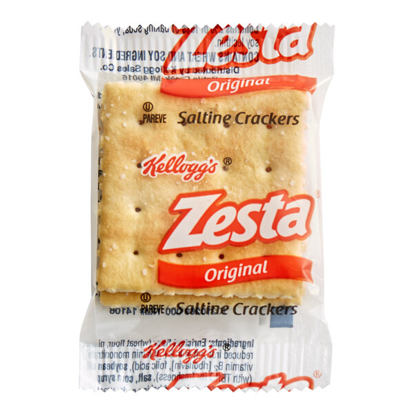 A small, clear plastic package containing two square saltine crackers with visible branding and text on the wrapper.