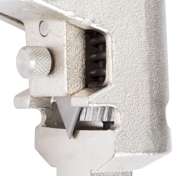 An Edlund silver metal manual can opener with a screw.