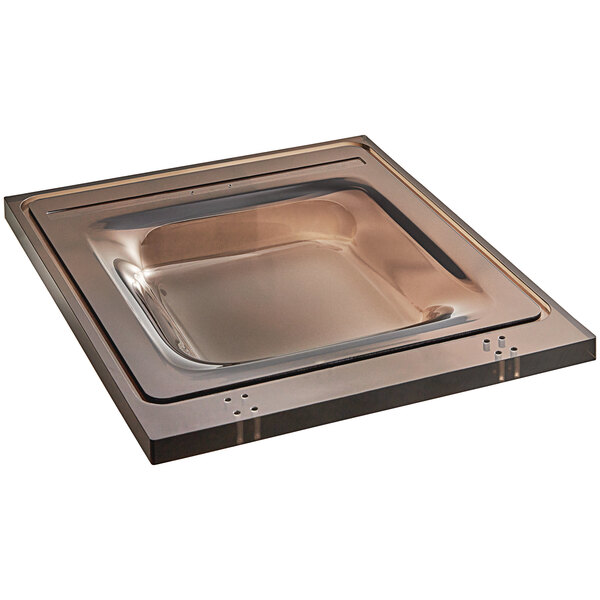 A square metal lid with a square edge.