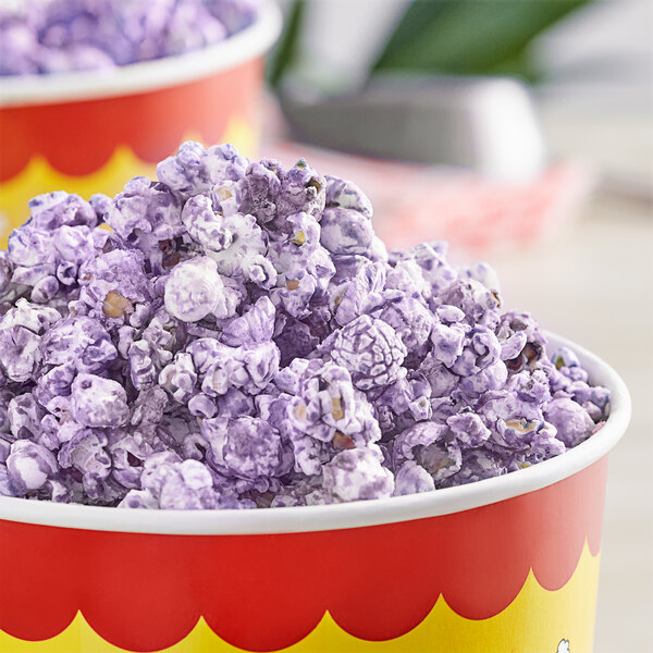 A bowl of Great Western grape-flavored purple popcorn with a purple lid.