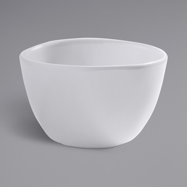 An American Metalcraft Crave white melamine ramekin on a gray background.