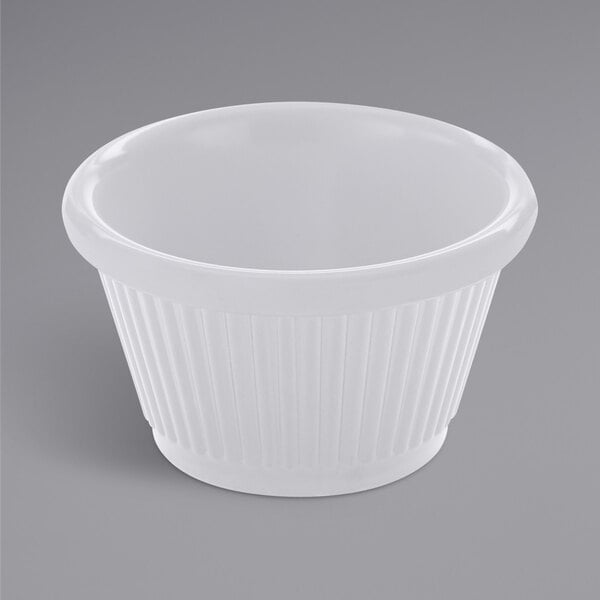 A fluted white American Metalcraft ramekin.