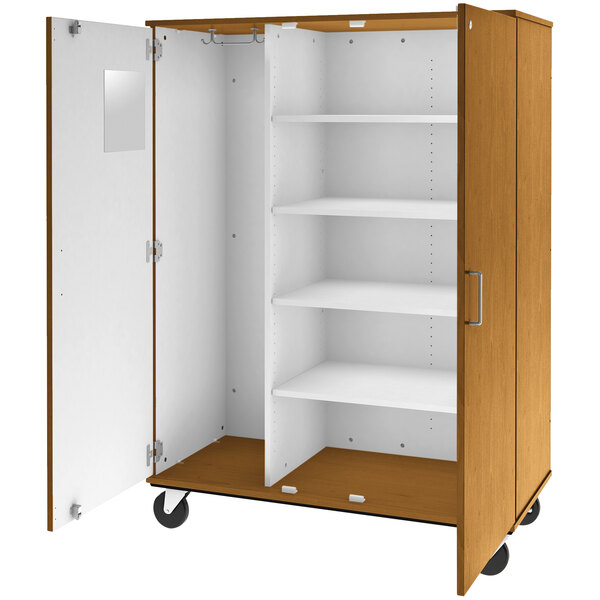 A light oak I.D. Systems wooden cabinet with shelves and doors.