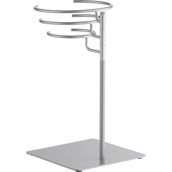 A silver metal stand with a round shelf.