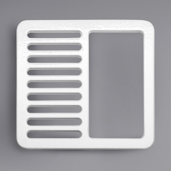 A white square Zurn enameled half grate with holes.