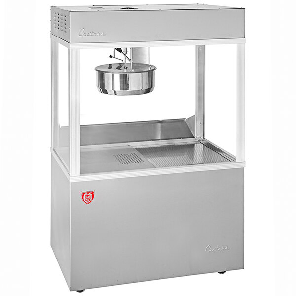 A silver Cretors floor model popcorn popper with a silver container on top.