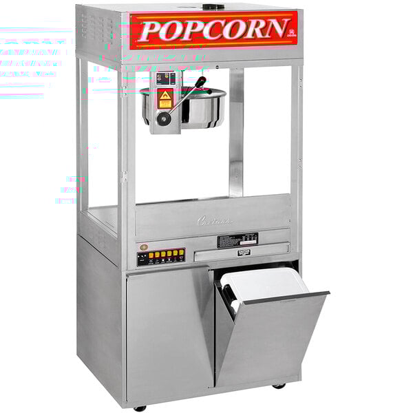 A Cretors floor model popcorn popper with a silver lid open.