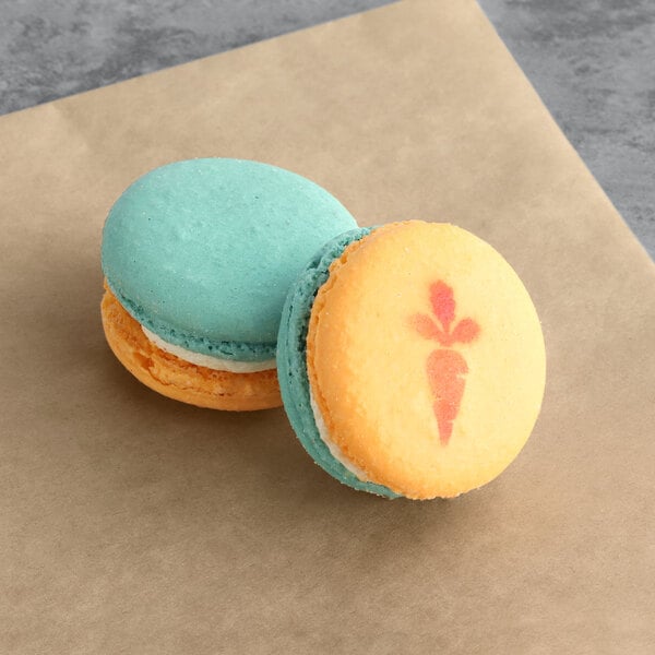 a close up of a blue and white macaroon