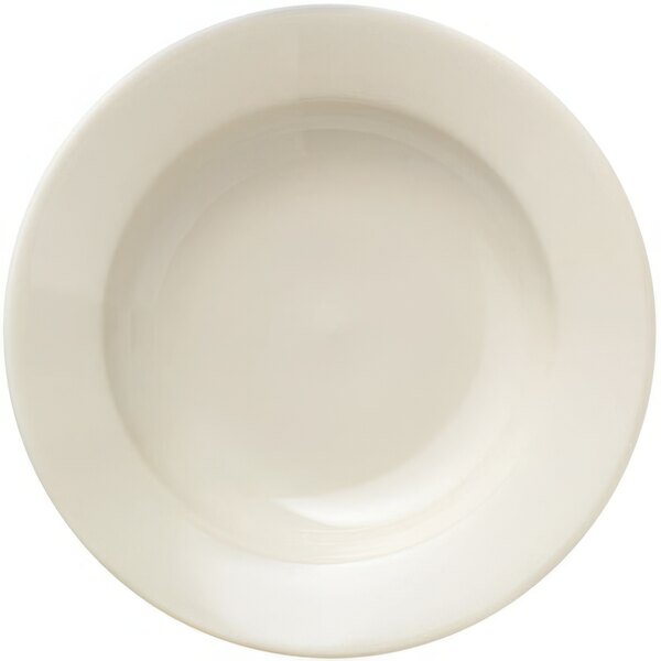 A Libbey Porcelana cream white pasta bowl with a wide rim.