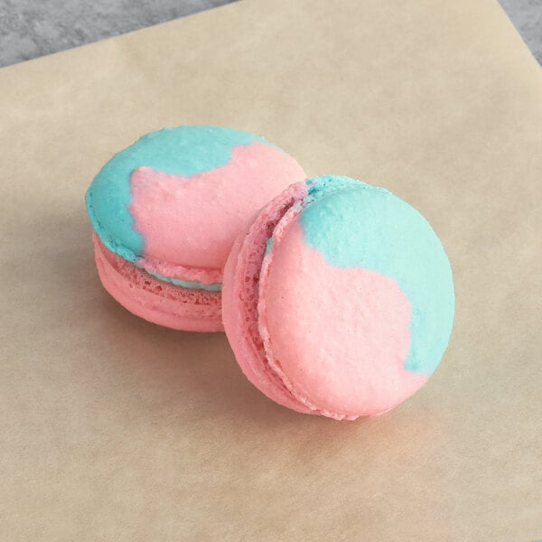 a pink and blue macaroons