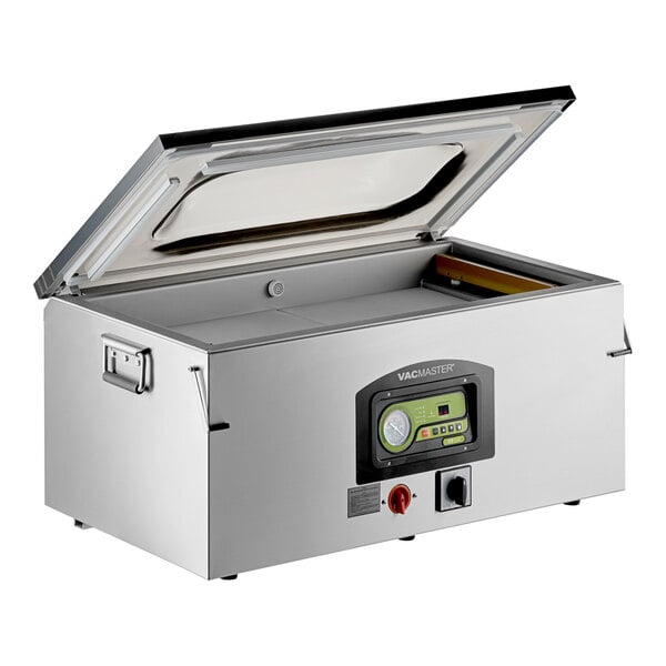 A stainless steel chamber vacuum packaging machine with a digital control panel and three seal bars, shown with the lid open.