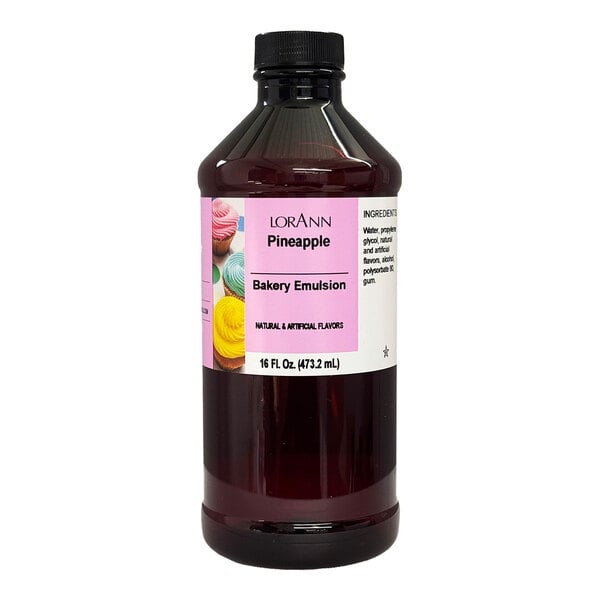 A close-up of a bottle of LorAnn Oils Pineapple Bakery Emulsion.