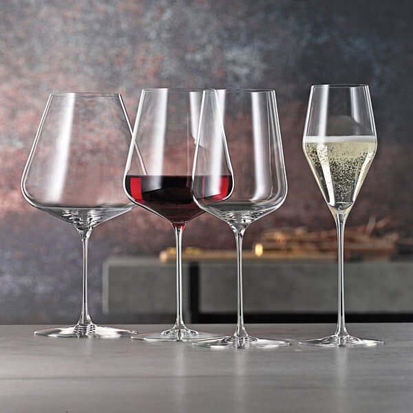 a close up of wine glasses
