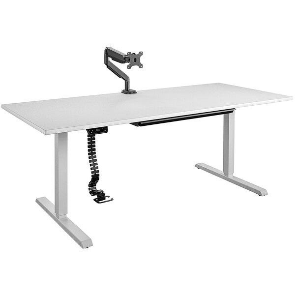 a white desk with a black arm attached to it