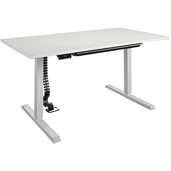 A white Bridgeport Pro-Desk with a black cable attached to it.