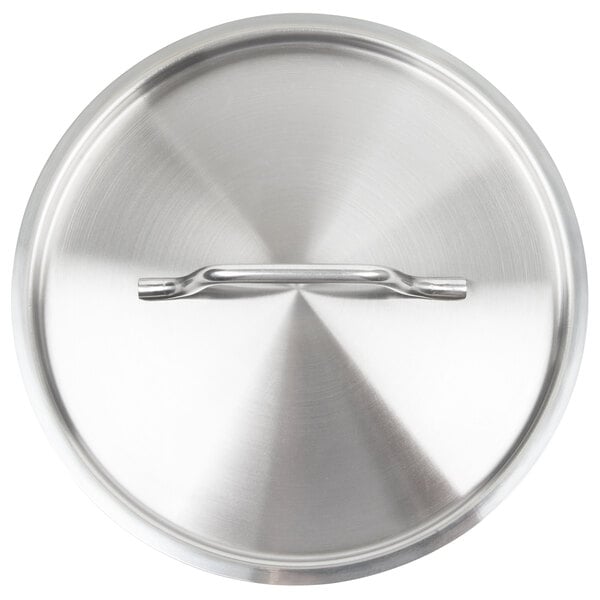 A close-up of a Vollrath stainless steel pan cover with a handle.