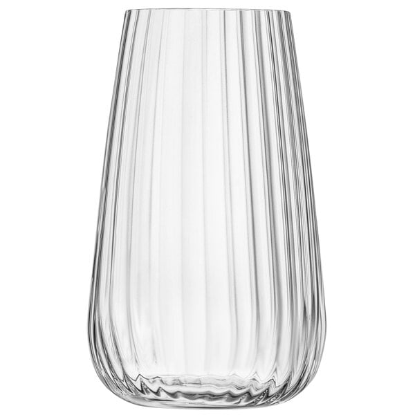 A Luigi Bormioli clear highball glass with a wavy design.