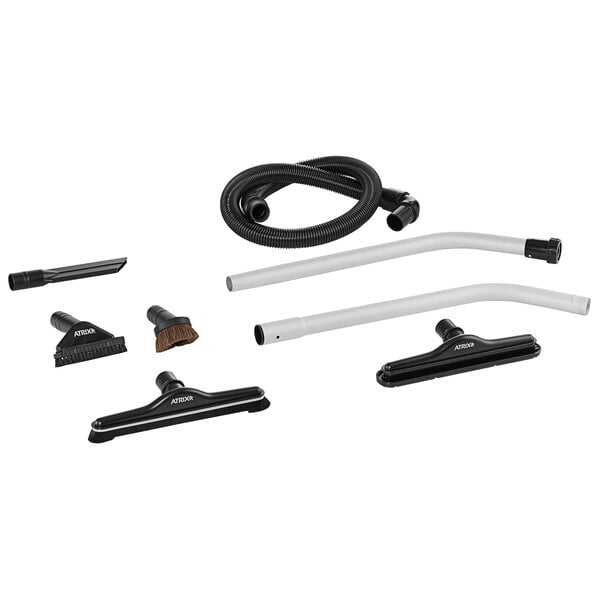 An Atrix backpack vacuum with hose and accessories.