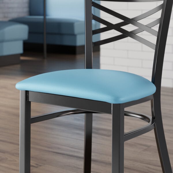 A blue vinyl padded seat for metal frame seating.