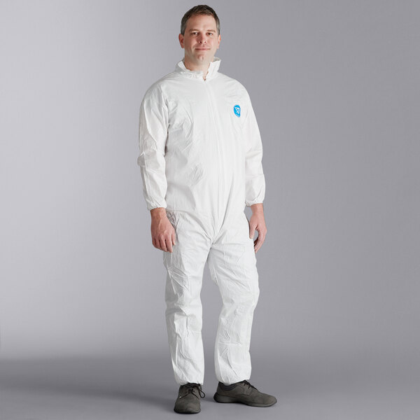 A man wearing white Malt Impact ProMax coveralls.