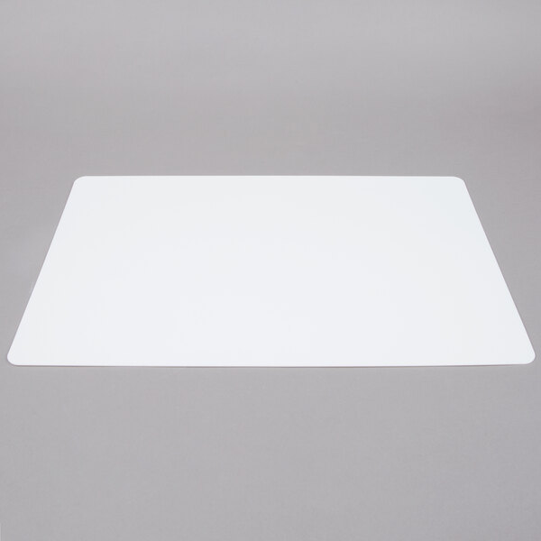 A white rectangular Tablecraft flexible cutting board.