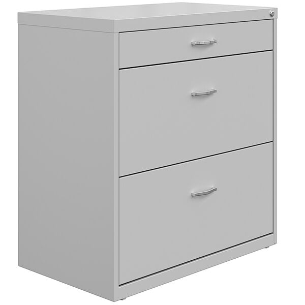 a white cabinet with drawers