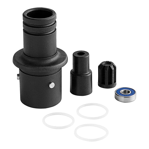 A black plastic coupling kit with round rubber and washer pieces.