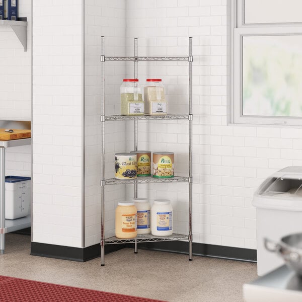 A Regency NSF chrome triangle wire shelf kit in a school kitchen with jars on it.