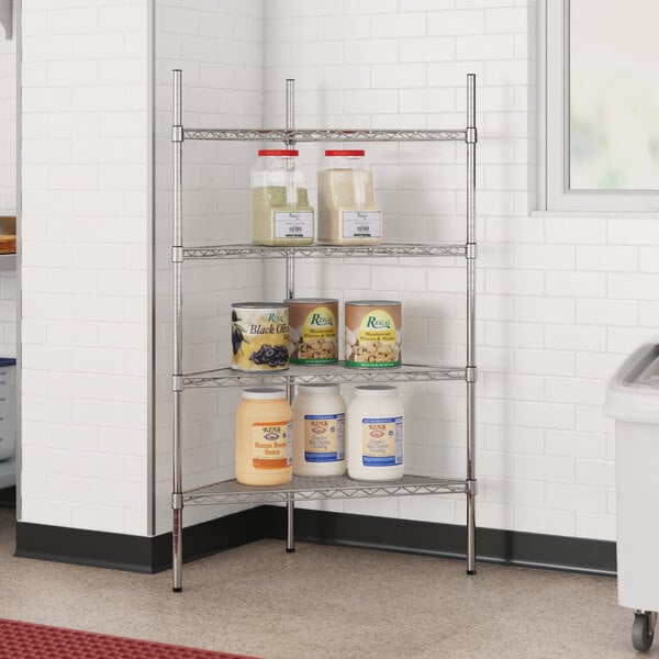 A metal Regency wire shelf with jars of food on it.