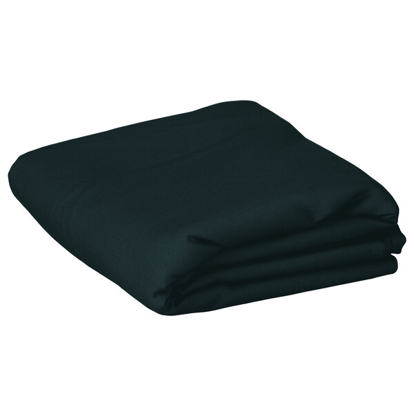 A folded hunter green rectangular cloth table cover.
