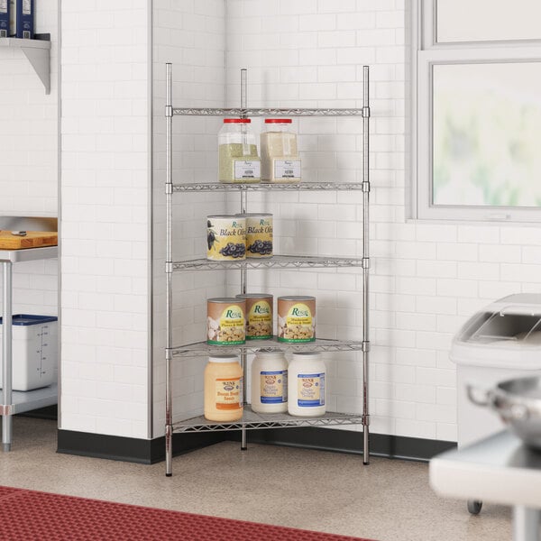 A Regency metal triangle wire shelf kit with jars of food on it.