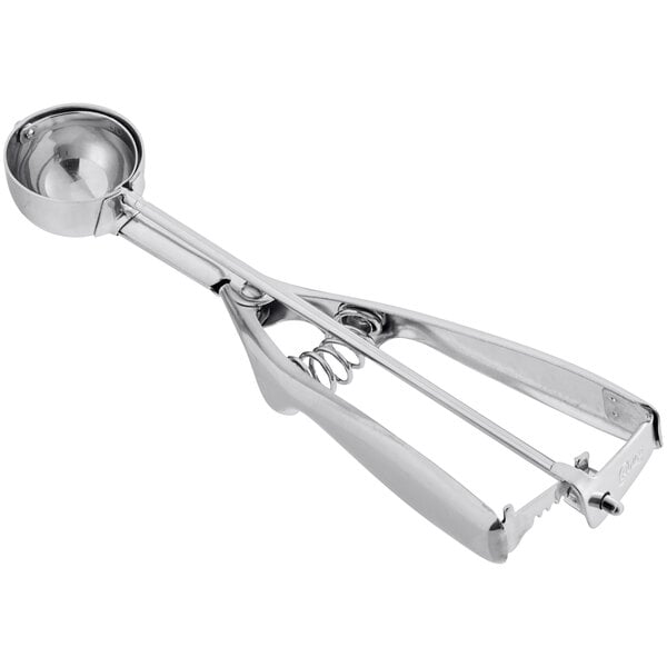 A silver stainless steel round squeeze handle ice cream scoop.