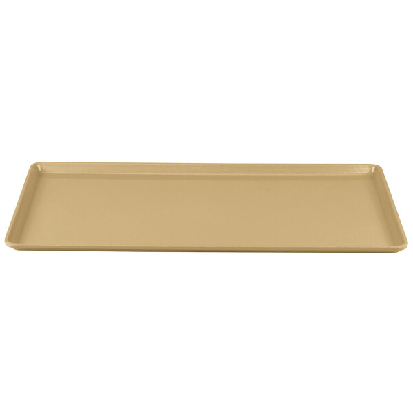 A rectangular tan Cambro dietary tray with a beige color.