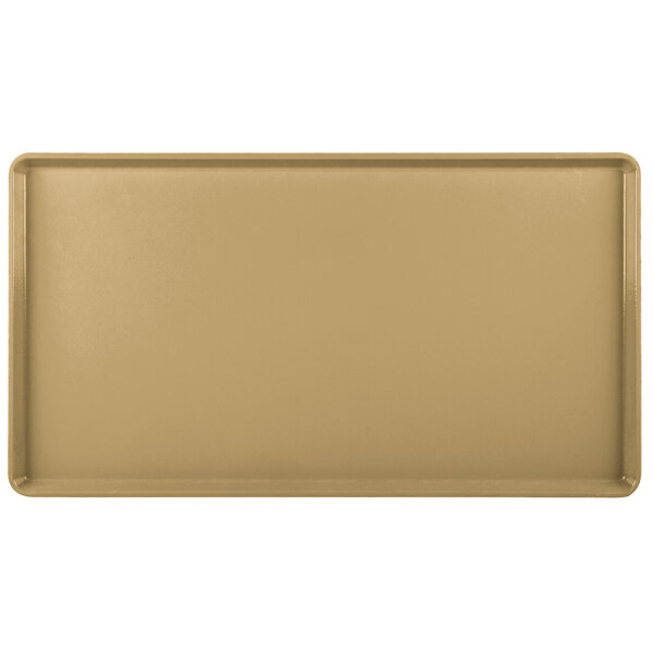 A rectangular tan Cambro dietary tray.