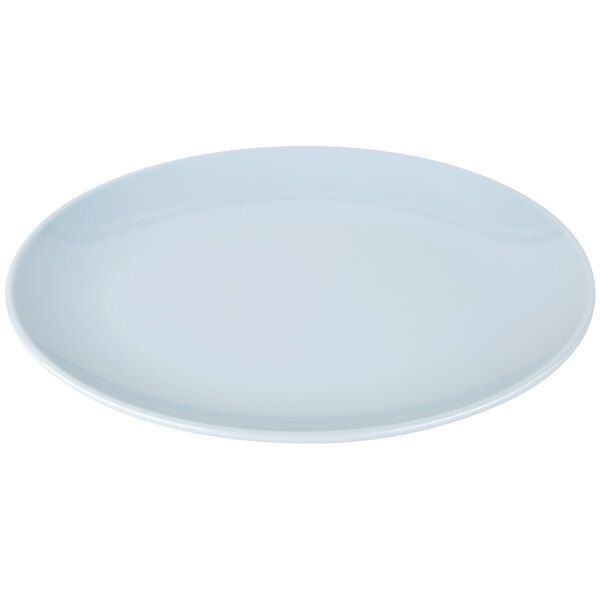 A white oval melamine platter with a blue rim.