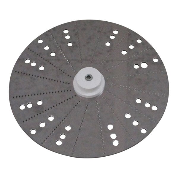 A circular metal Robot Coupe Rostis potatoes grating and shredding disc with holes.