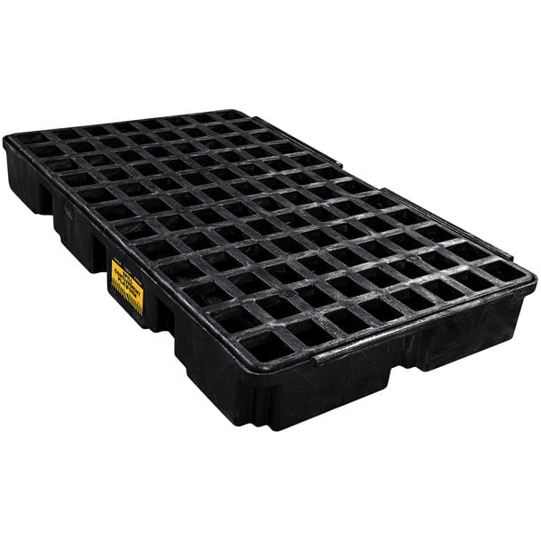 A black plastic pallet with a grid and drain holes.