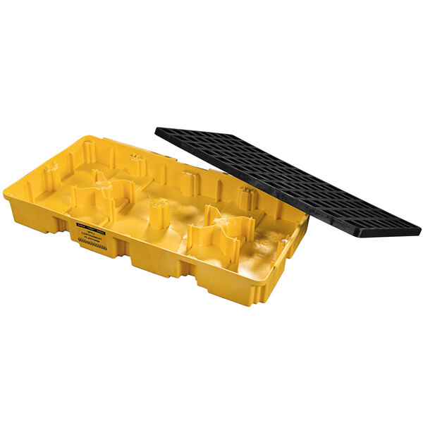 A yellow plastic containment platform for two drums with a drain.