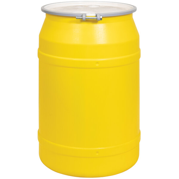 A yellow Eagle Manufacturing plastic barrel drum with a metal bolt ring lid.